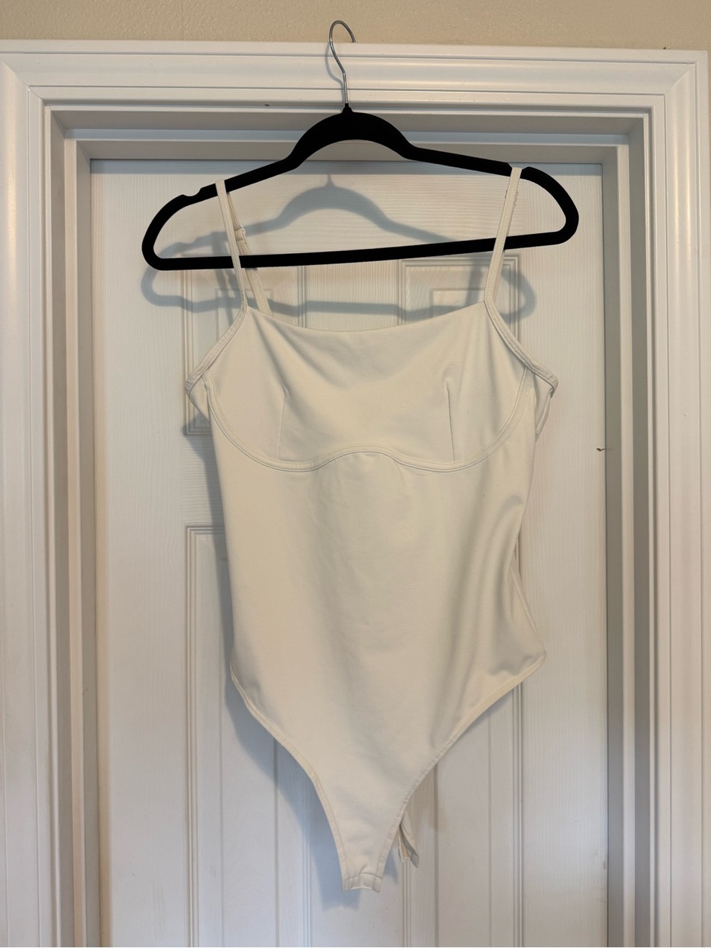 Qinsen Simple White Spaghetti Strap Bodysuit